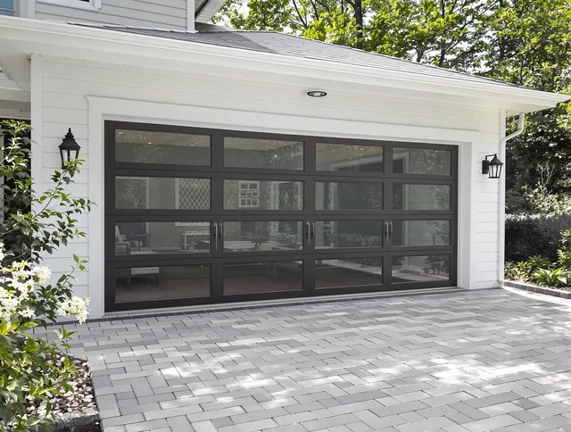 Palm Beach Gardens Garage Door Repair design specialist presenting custom garage door options to Palm Beach Gardens homeowner