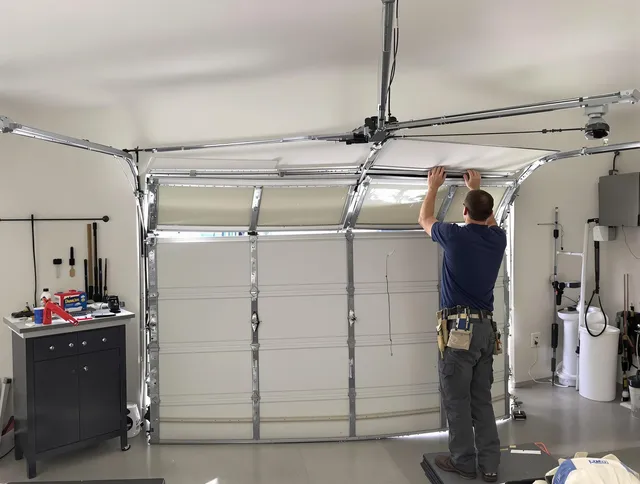 Palm Beach Gardens Garage Door Repair specialist performing precise section replacement on Palm Beach Gardens garage door