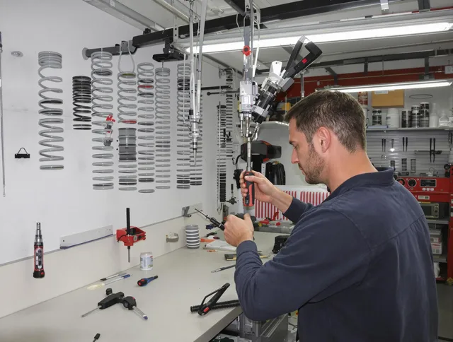 Palm Beach Gardens Garage Door Repair safety certified technician performing precision spring replacement in Palm Beach Gardens