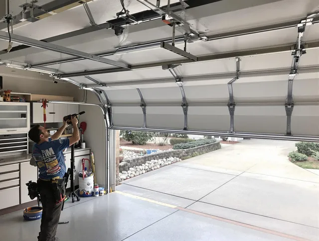 Garage door track repair service by Palm Beach Gardens Garage Door Repair in Palm Beach Gardens